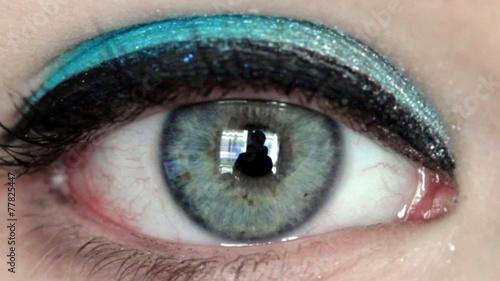woman open blue eye