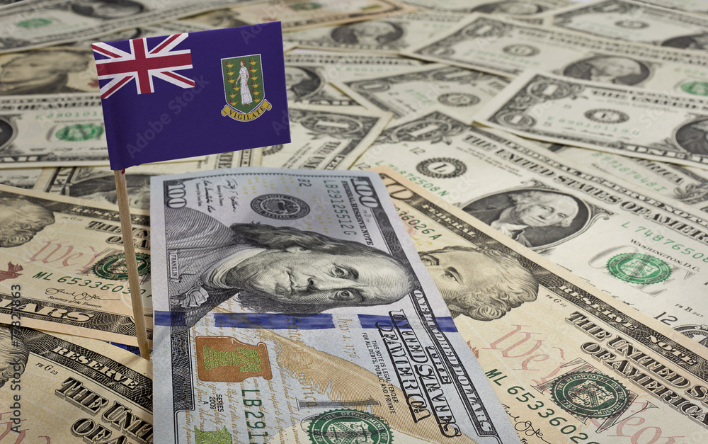 Flag of Virgin Islands (UK) sticking in various american banknot Flag of Virgin Islands (UK) sticking in various american banknot