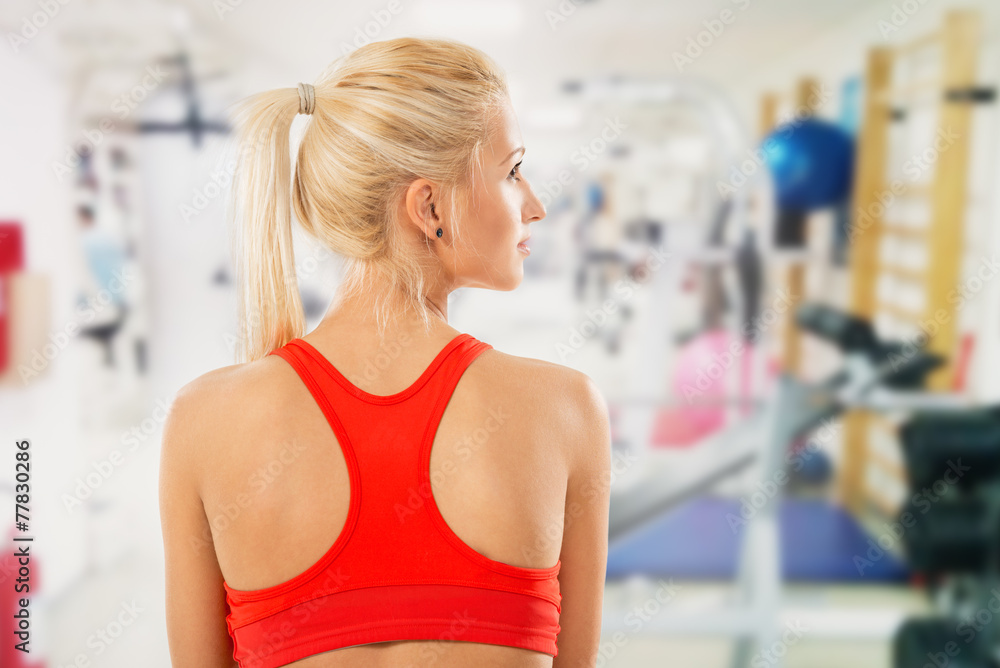 Rear View Of Young Woman In Gym