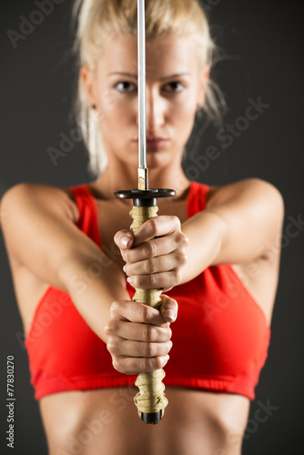 Sword In The Hands Of A Beautiful Woman