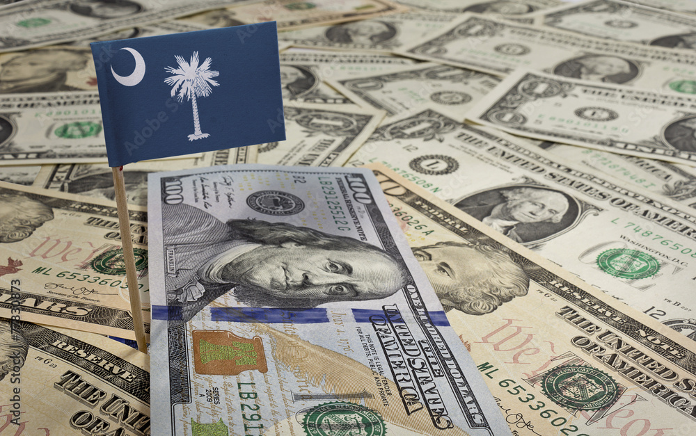 Flag of South Carolina sticking in various american banknotes.(s Flag of South Carolina sticking in various american banknotes.(s