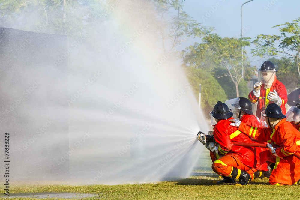 Firefighter fighting for fire attack training