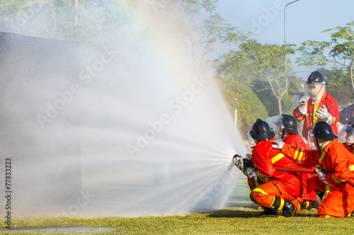 Firefighter fighting for fire attack training