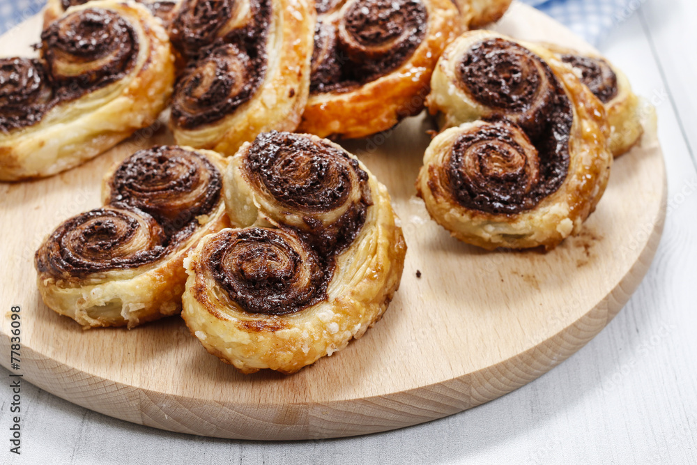 Palmier biscuits - french cookies made of puff pastry and chocol