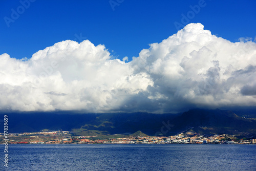 Stormy clouds over Los Cristianos resort in Tenerife  Canary Islands  Spain