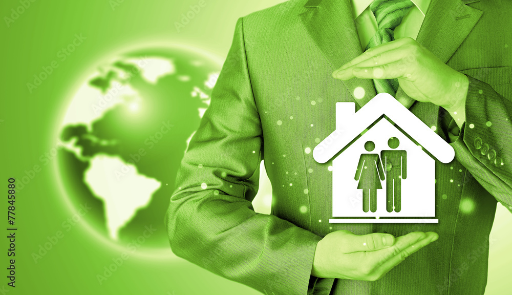 businessman protecting family in home with hands businessman protecting family in home with hands