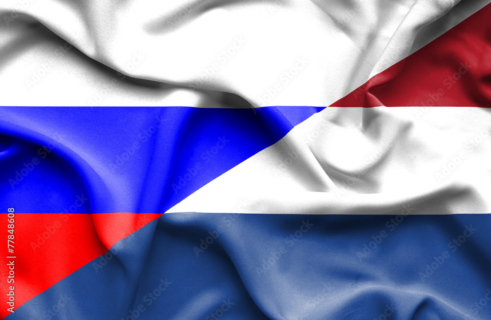 Waving flag of Netherlands and Russia Waving flag of Netherlands and Russia
