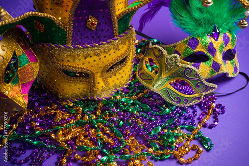 Fotografie Assorted Mardi Gras or Carnivale mask on a purple background