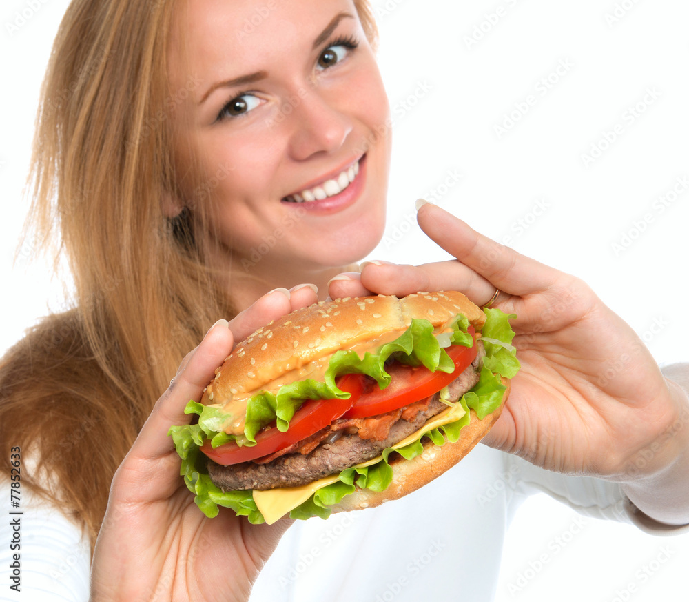 Woman showing tasty unhealthy burger sandwich Woman showing tasty unhealthy burger sandwich