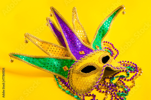 Mardi Gras Mask on yellow Background