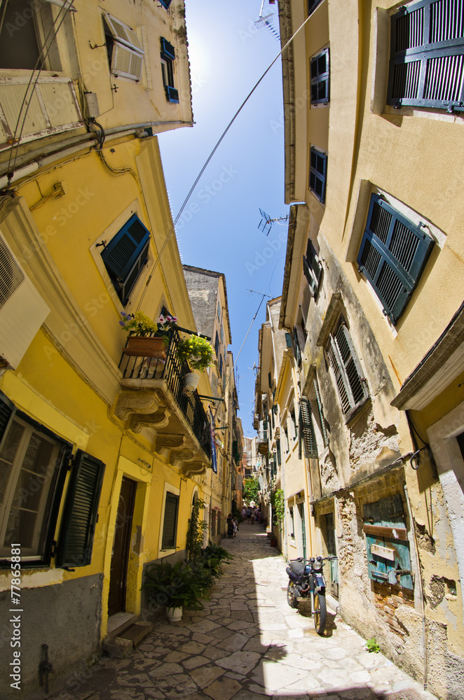 Narrow street in mediterranean town - Corfu, Greece