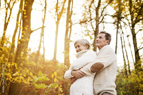 Active seniors taking walk in nature