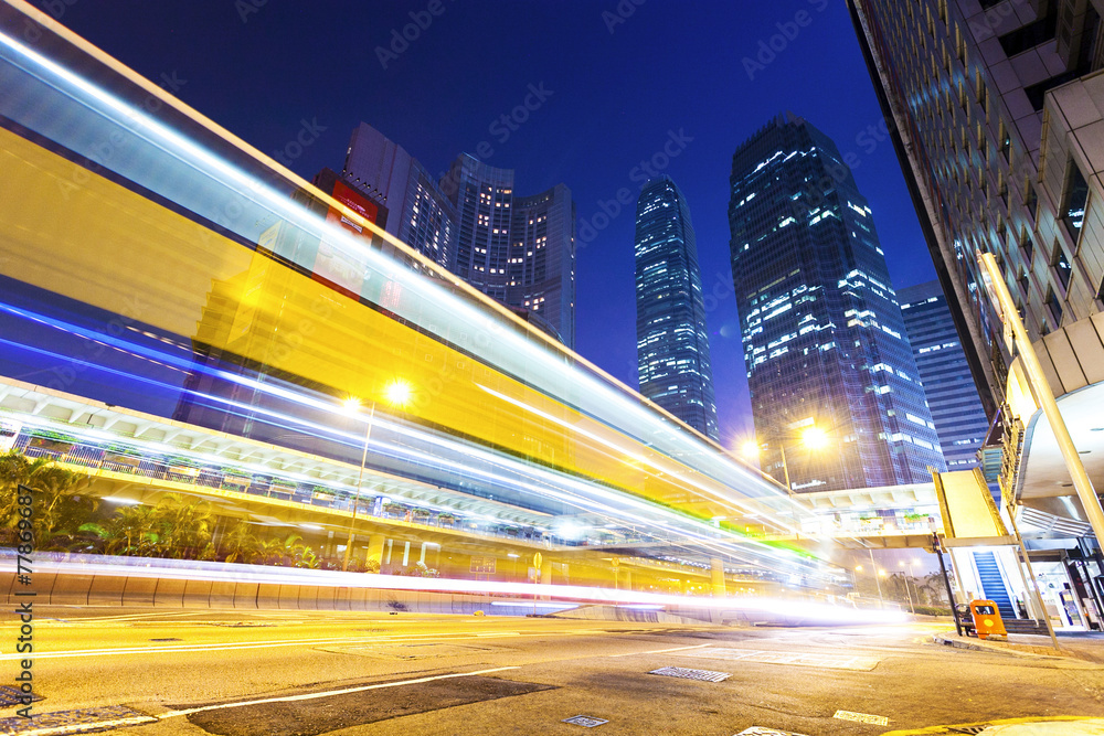 Fototapeta premium traffic light trails in modern city at night