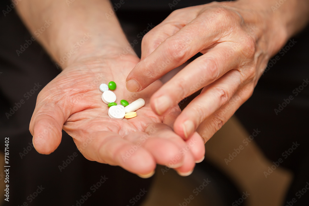 close-up old man's hands with pills close-up old man's hands with pills