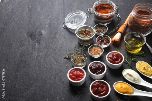 Various Condiments on Table with Copy Space