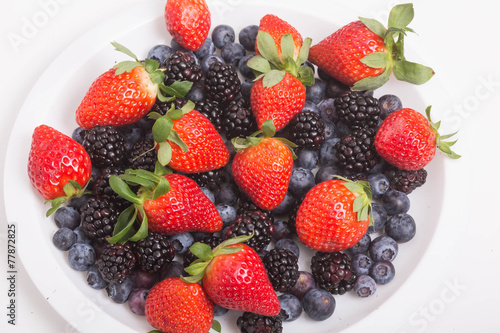 Strawberries Blackberries and Blueberries in White Plate