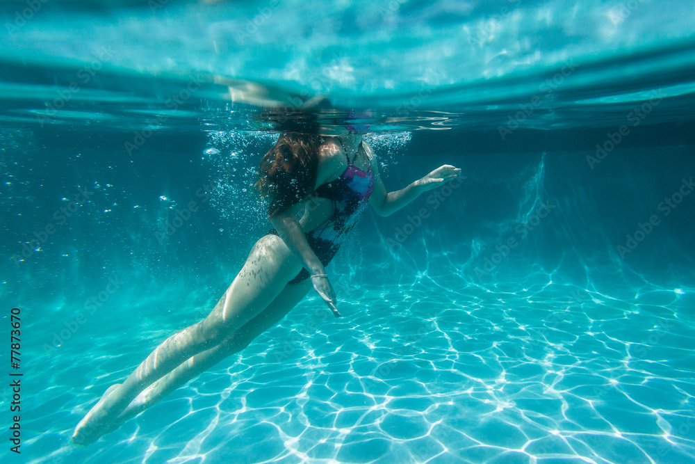 © ChrisVanLennepPhoto - Girl Underwater Surfaces © ChrisVanLennepPhoto - Girl Underwater Surfaces