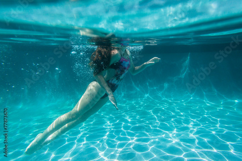 Girl Underwater Surfaces