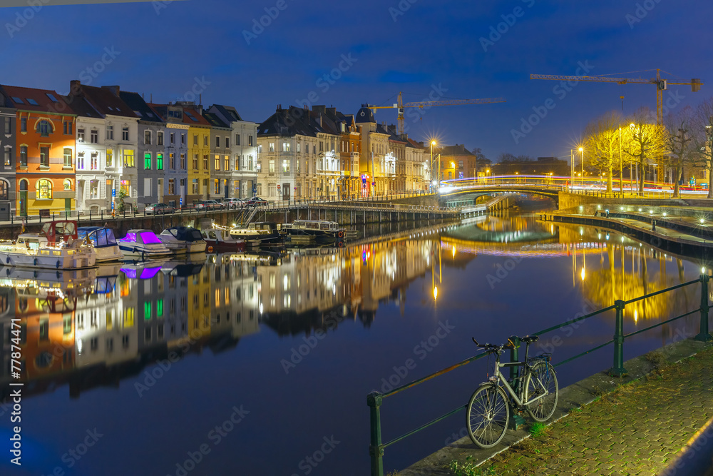 Embankment of the river Leie in Ghent town at night, Belgium
