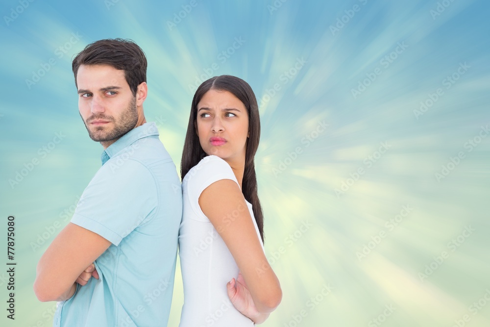 Fototapeta premium Composite image of unhappy couple not speaking to each other