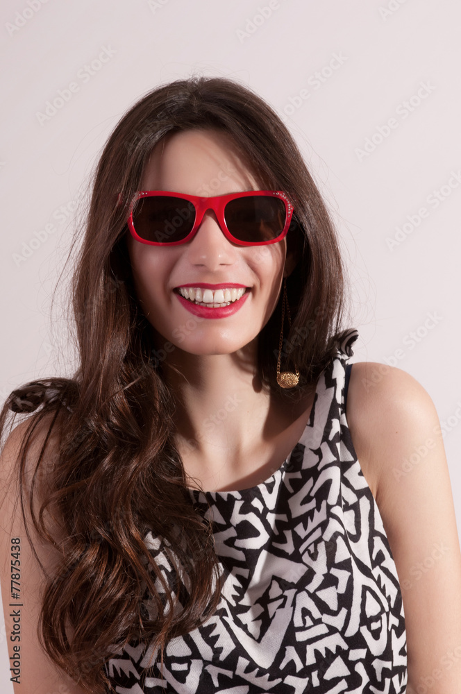 Pretty woman portrait in red sunglasses Pretty woman portrait in red sunglasses