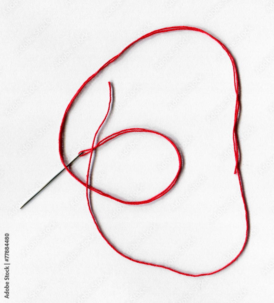 Close-up of the sewing needle with thread Close-up of the sewing needle with thread