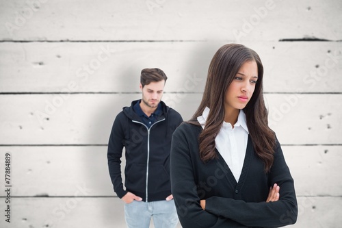 Composite image of unhappy couple not speaking to each other