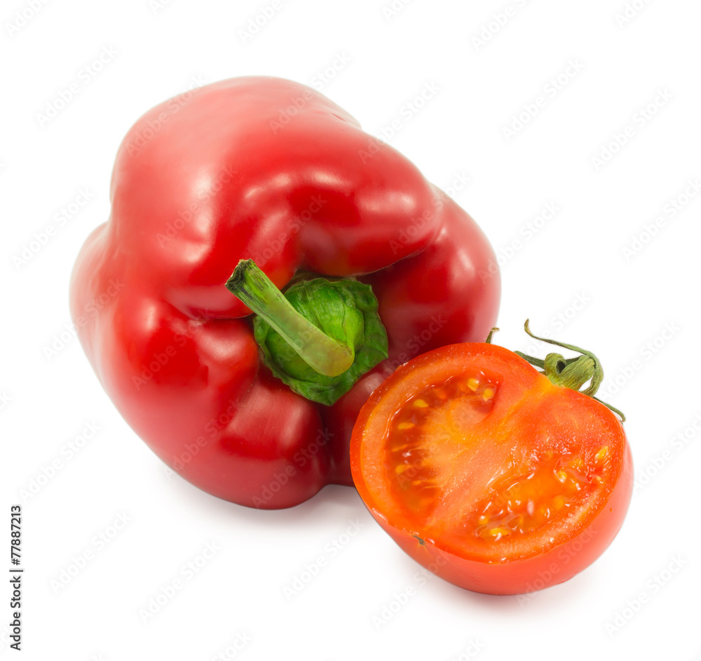 red bell pepper and tomato isolated on white background red bell pepper and tomato isolated on white background