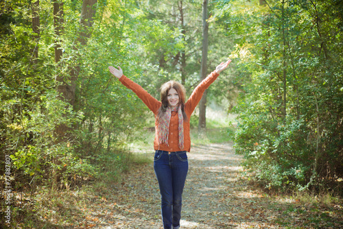 Wallpaper Mural Beautiful girl walking in the autumn forest  Torontodigital.ca