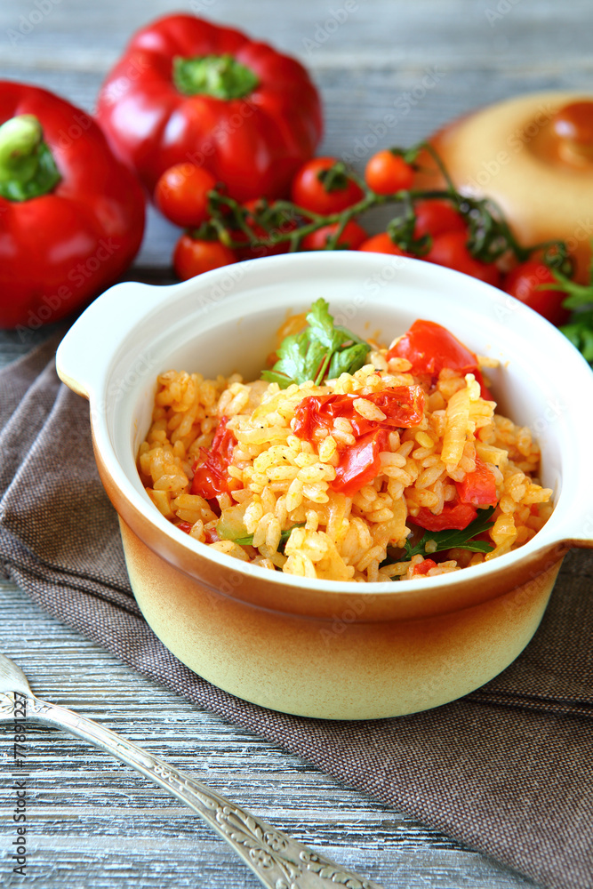 Rice with vegetables in a pot on boards Rice with vegetables in a pot on boards