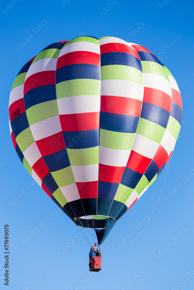 Naklejka premium colorful hot air balloon in flight