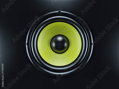 Musical sound speaker on black background