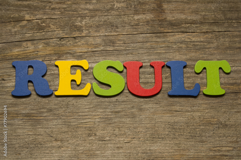 Naklejka premium result word on a wooden background