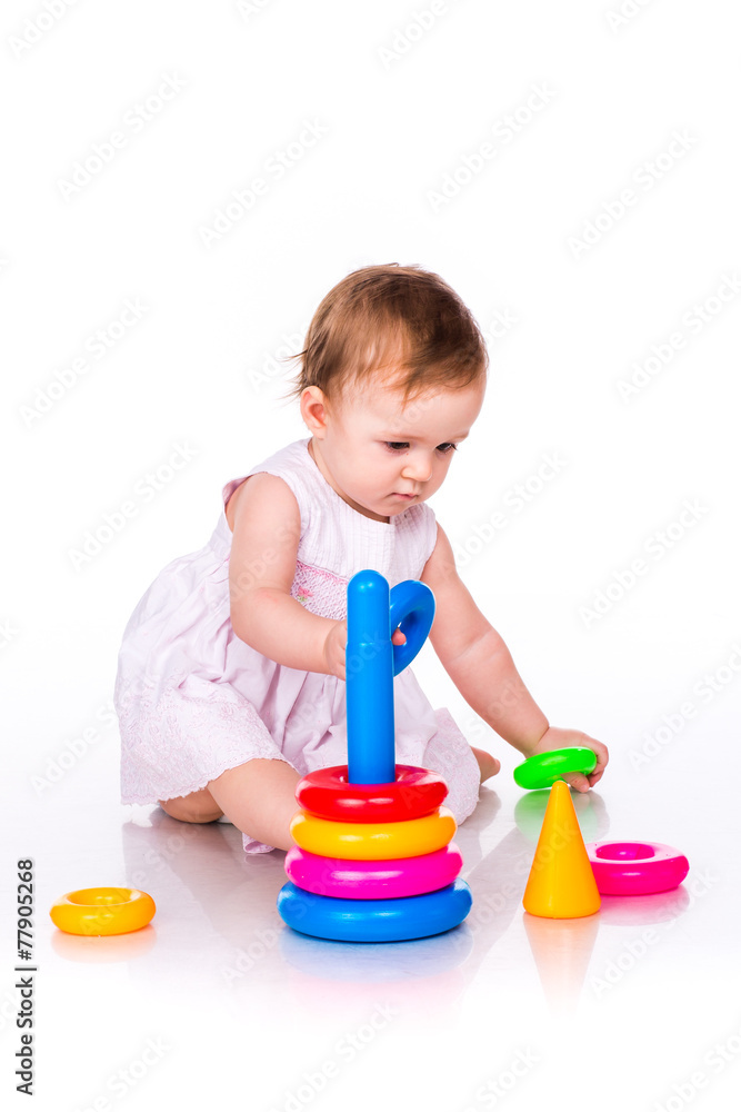 Baby playing with stacking rings Baby playing with stacking rings