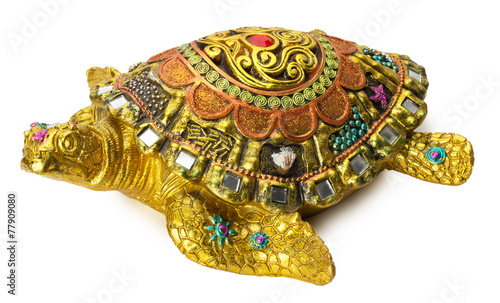 turtle statuette with gemstones isolated on the white background