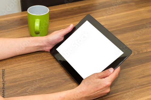 Hand Holding Tablet with Blank Screen