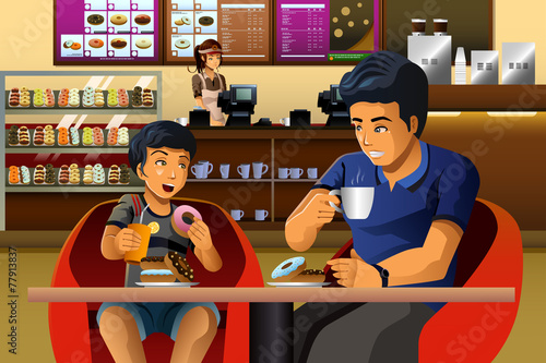 Father and son eating  breakfast