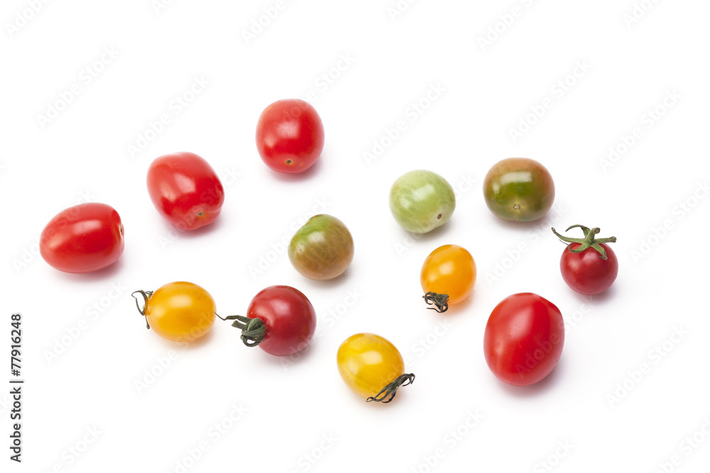 Colorful tomatoes on background Colorful tomatoes on background