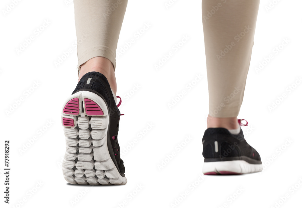 Runner feet. Woman fitness sneakers Runner feet. Woman fitness sneakers