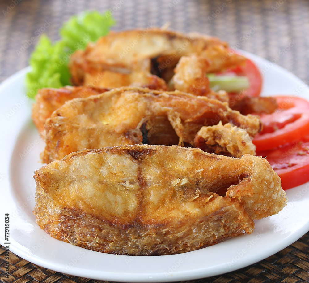 Fish dish - fried fish fillet with vegetables Fish dish - fried fish fillet with vegetables