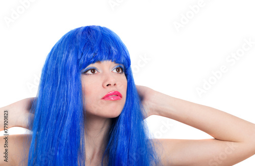 Portrait of beautiful woman in blue wig