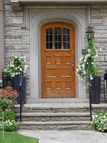 front door with flower pots