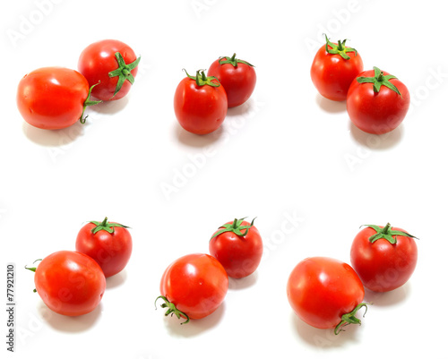 collection of tomatoes with a light shadows isolated on white