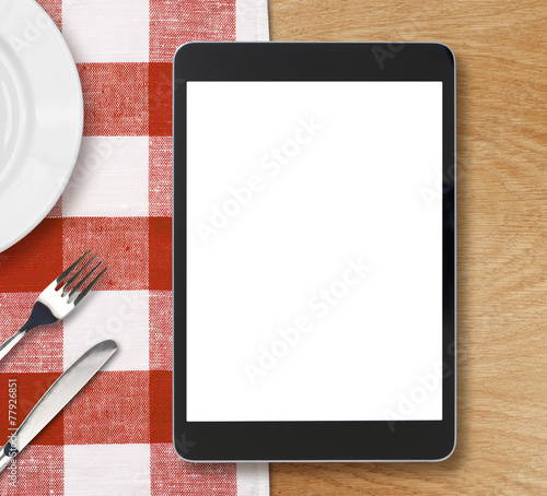 black tablet pc or ipad on ...