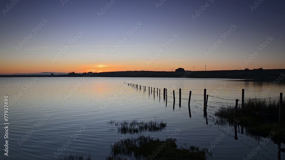 Timelapse of dusk falling over Dozmary Pool in Cornwall Timelapse of dusk falling over Dozmary Pool in Cornwall