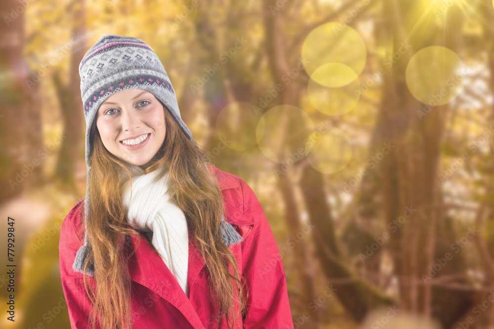 Composite image of pretty redhead in warm clothing Composite image of pretty redhead in warm clothing