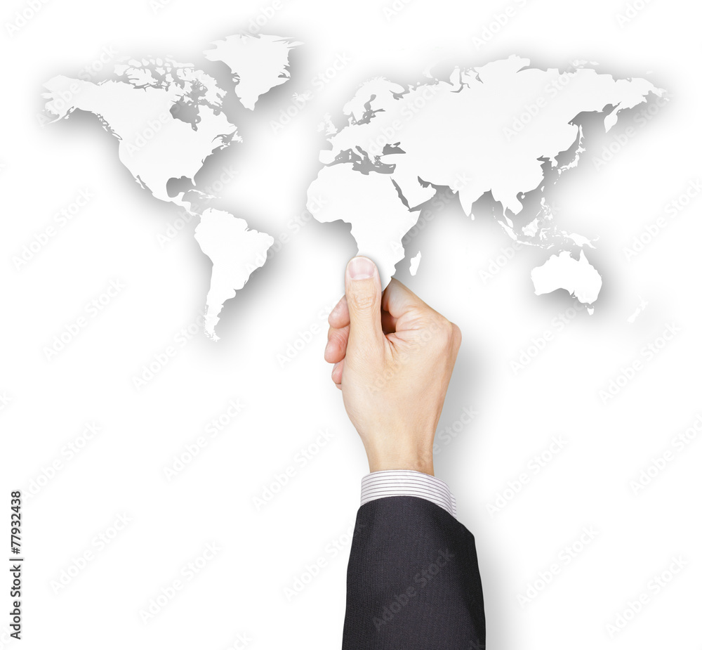 Hand of businessman holding world map paper Hand of businessman holding world map paper