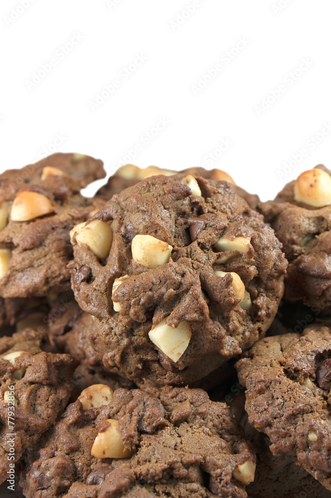 Pile of macadamia cookies isolated on white Pile of macadamia cookies isolated on white