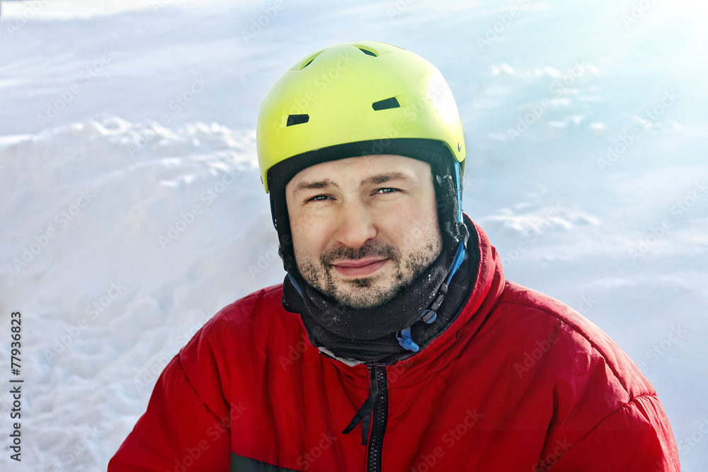 Young sporty man in a helmet in winter Young sporty man in a helmet in winter