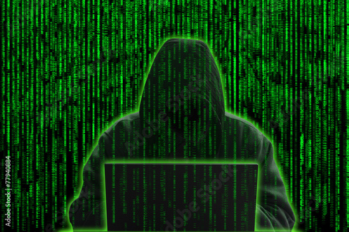 ceptual image of a hacker on matrix background